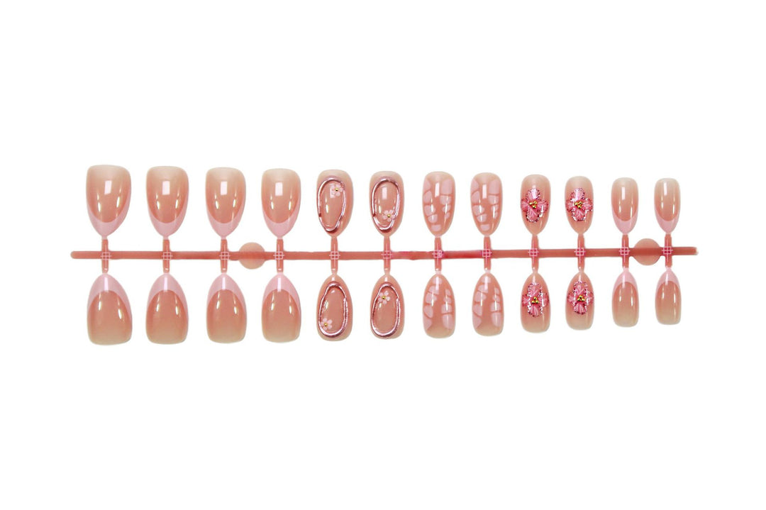 Artificial nail set with floral decorations and elegant accents Stornfield