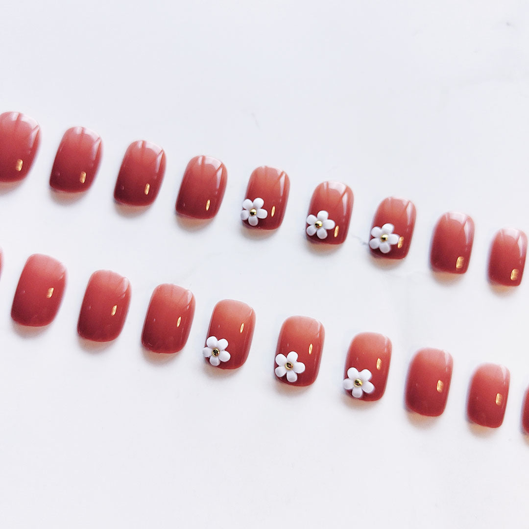 Elegant artificial nails with floral designs Stornfield