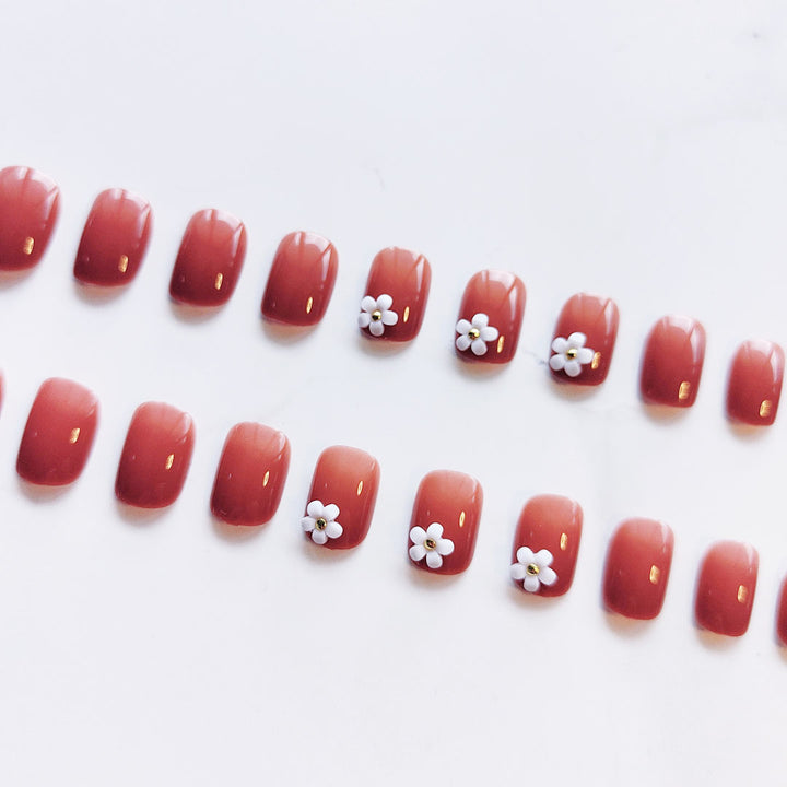 Elegant artificial nails with floral designs Stornfield