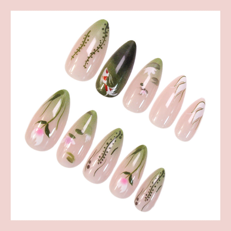 Acrylic nail set with floral designs and elegant accents Stornfield