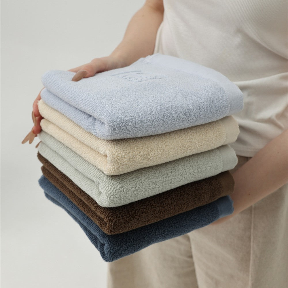 Luxury cotton terry towel set with logo border and extra soft Turquetto structure