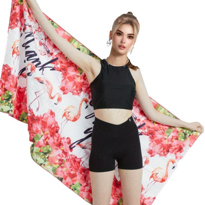 Beach towel with eye-catching flamingo design and quick-drying material Stornfield