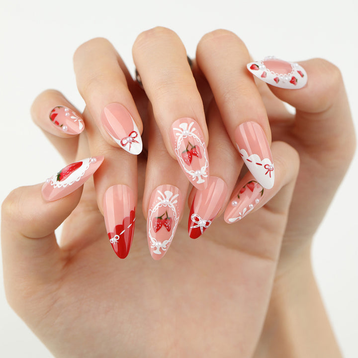 Artful nail extensions with strawberry motifs Stornfield