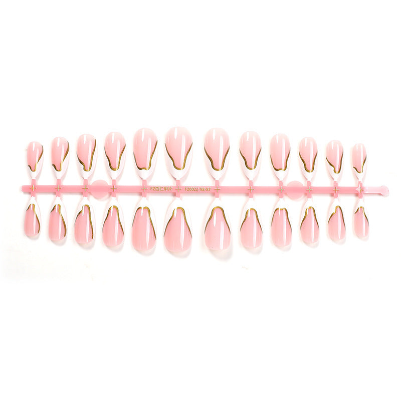 High-quality artificial nail set with elegant gold accents Stornfield
