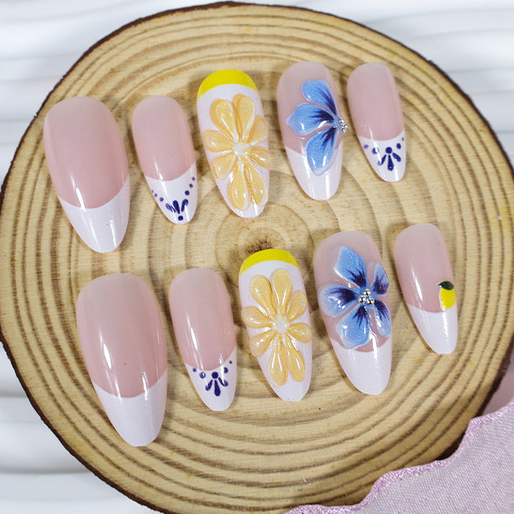 Nail art set with elegant floral and butterfly accents Stornfield