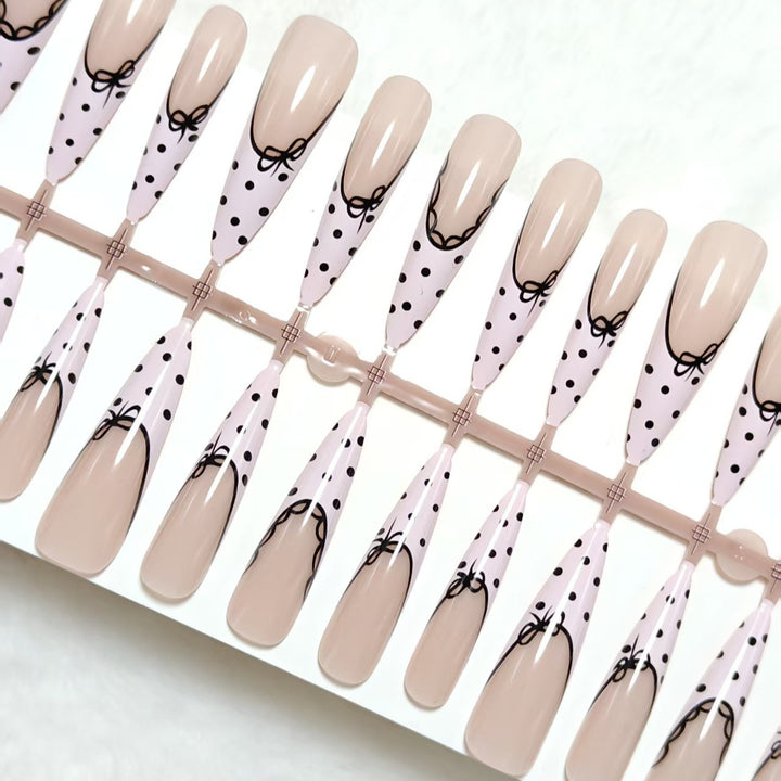 Artificial nail tips with bow pattern Stornfield