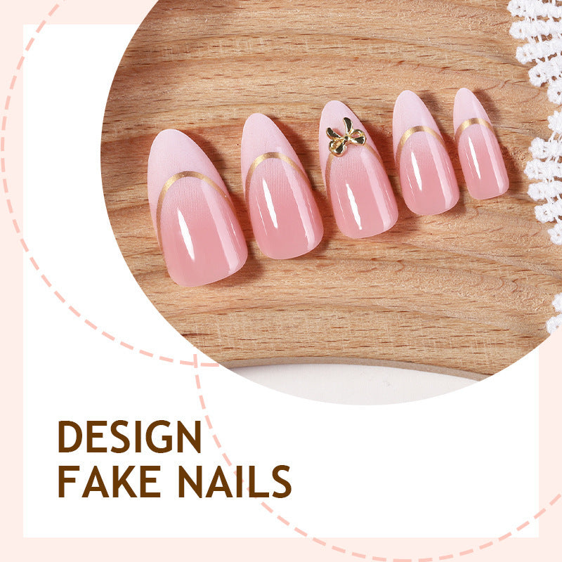 Artificial nail set with elegant gold edge and decorative accents Stornfield