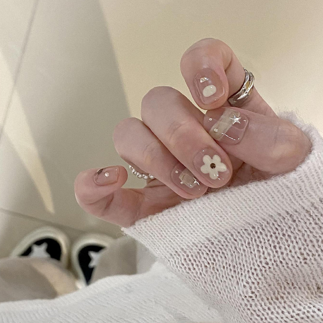 Artificial nails with elegant floral designs Stornfield