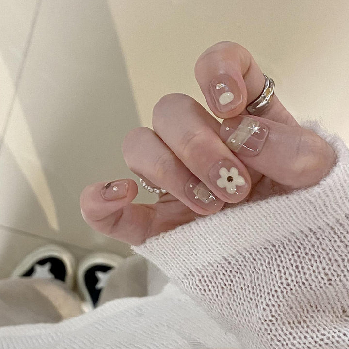 Artificial nails with elegant floral designs Stornfield