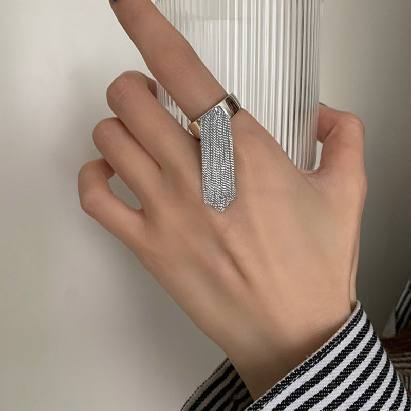 Stylish ring with filigree tassel design Stornfield