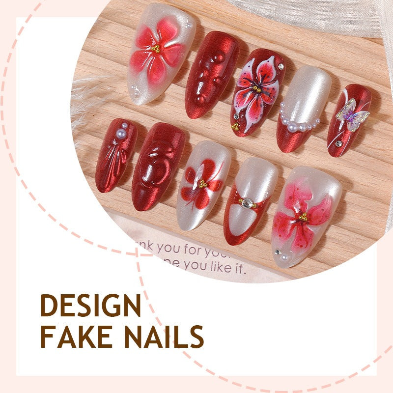 Artificial nail set with floral designs and glamorous accents Stornfield