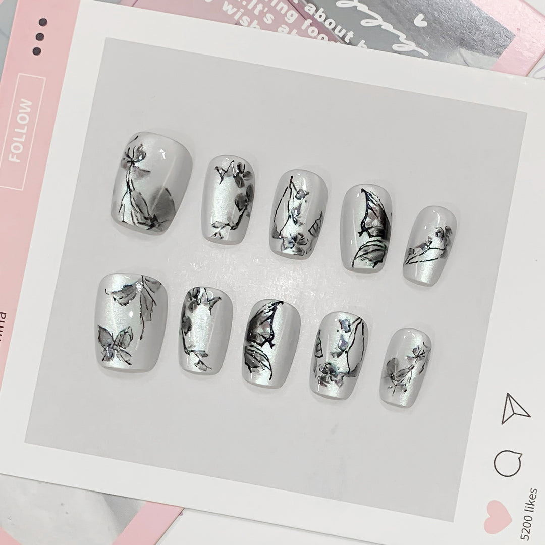 Artistic fake nails with floral patterns Stornfield