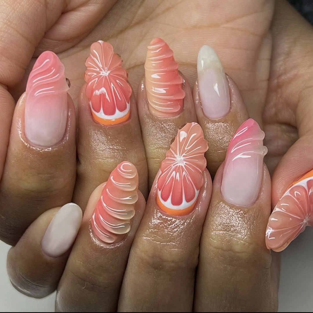 Creative nail set with subtle ombre effects and elegant decorative elements Stornfield