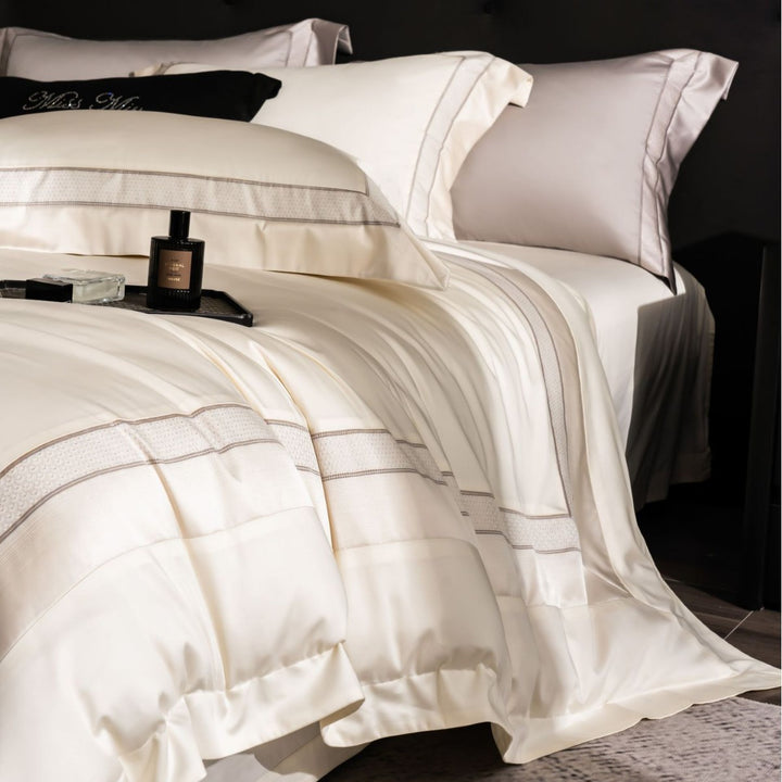 Luxurious cotton bedding set with quilted blanket and fine pillowcases