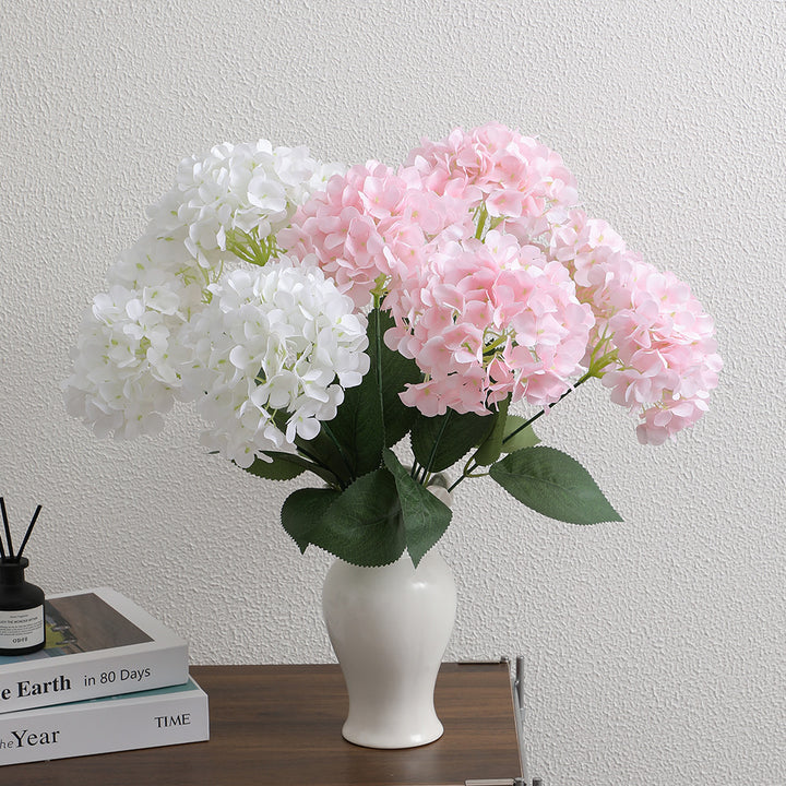 Decorative artificial flower arrangement