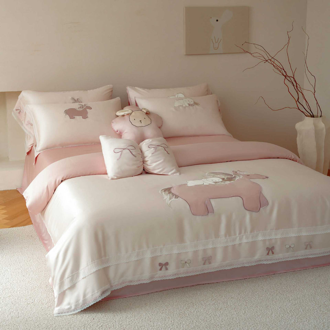 Child bedding set made of cotton satin with appliqués, ruffles, and cuddle pillow