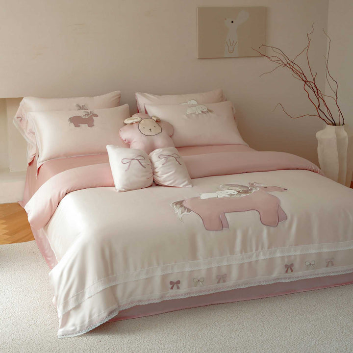 Child bedding set made of cotton satin with appliqués, ruffles, and cuddle pillow