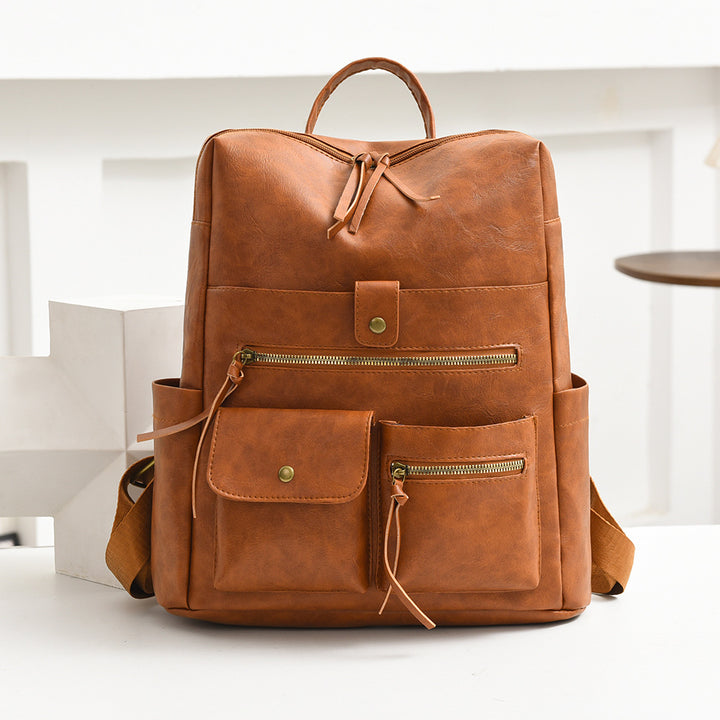 Stylish Multi-Pocket Faux Leather Backpack Stornfield
