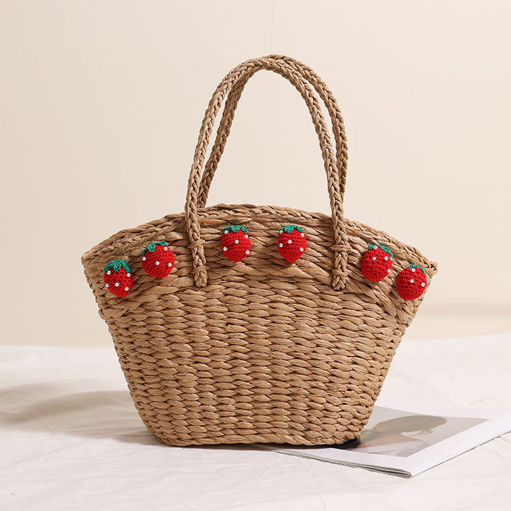 Handmade basket bag with playful strawberry motif Stornfield