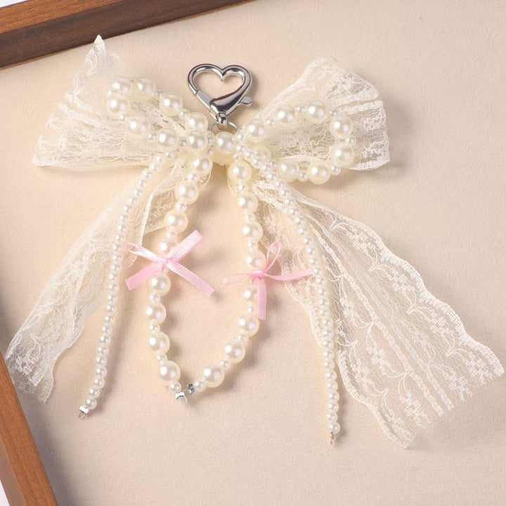 Elegant Pearl and Lace Charm Keychain Stornfield