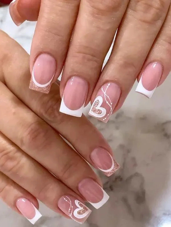 Elegant Heart-Embellished Nail Art Design Stornfield