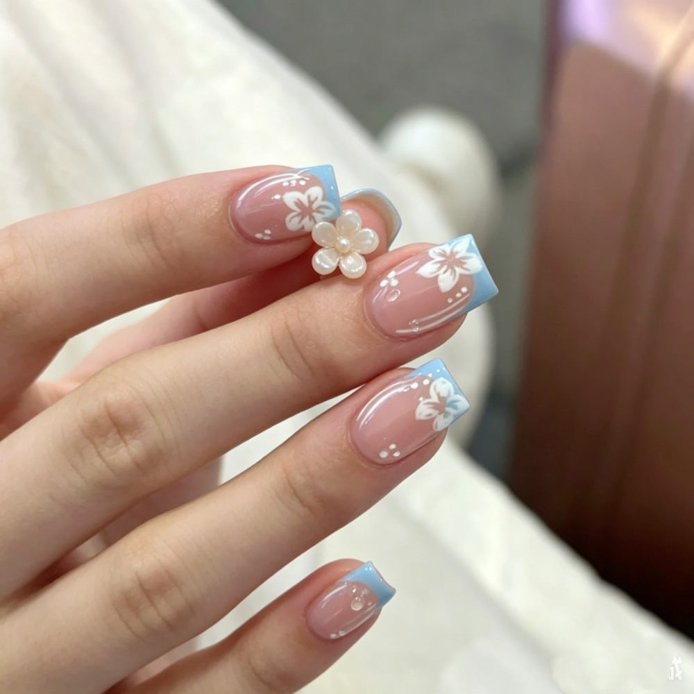 Artificial nails with floral accents Stornfield