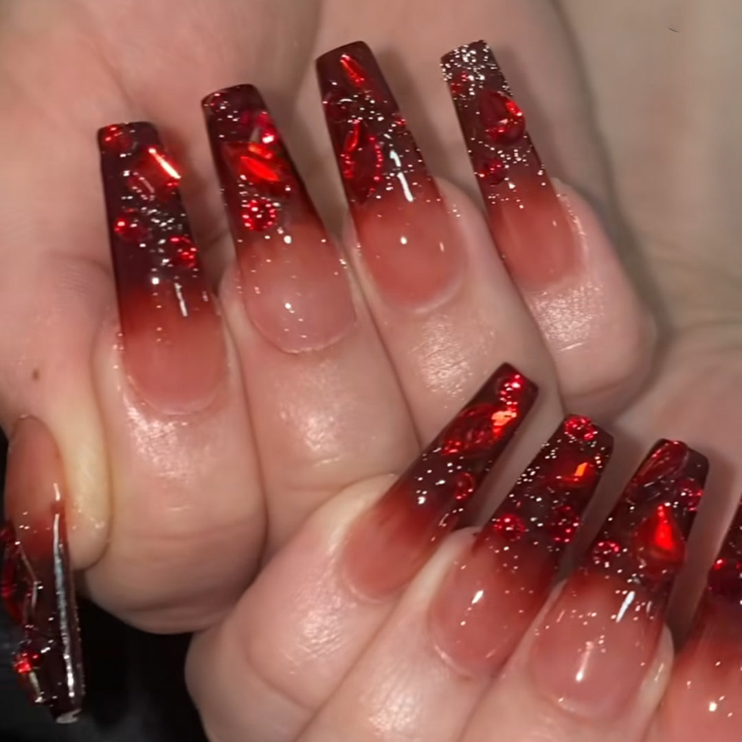 Creative Stiletto Nail Art with Blood Red Accents Stornfield
