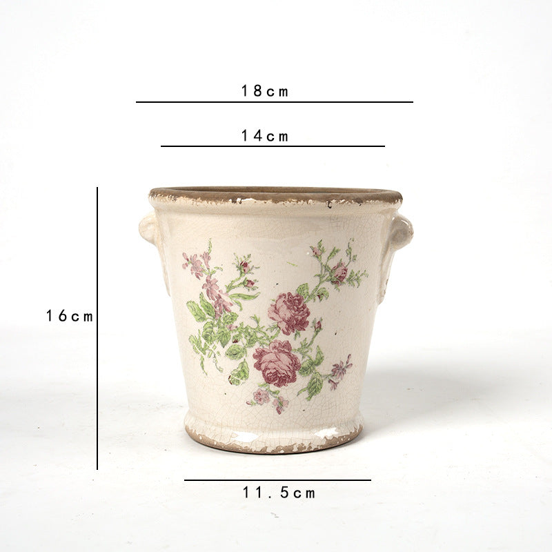 Decorative flower pot with floral embellishments Stornfield
