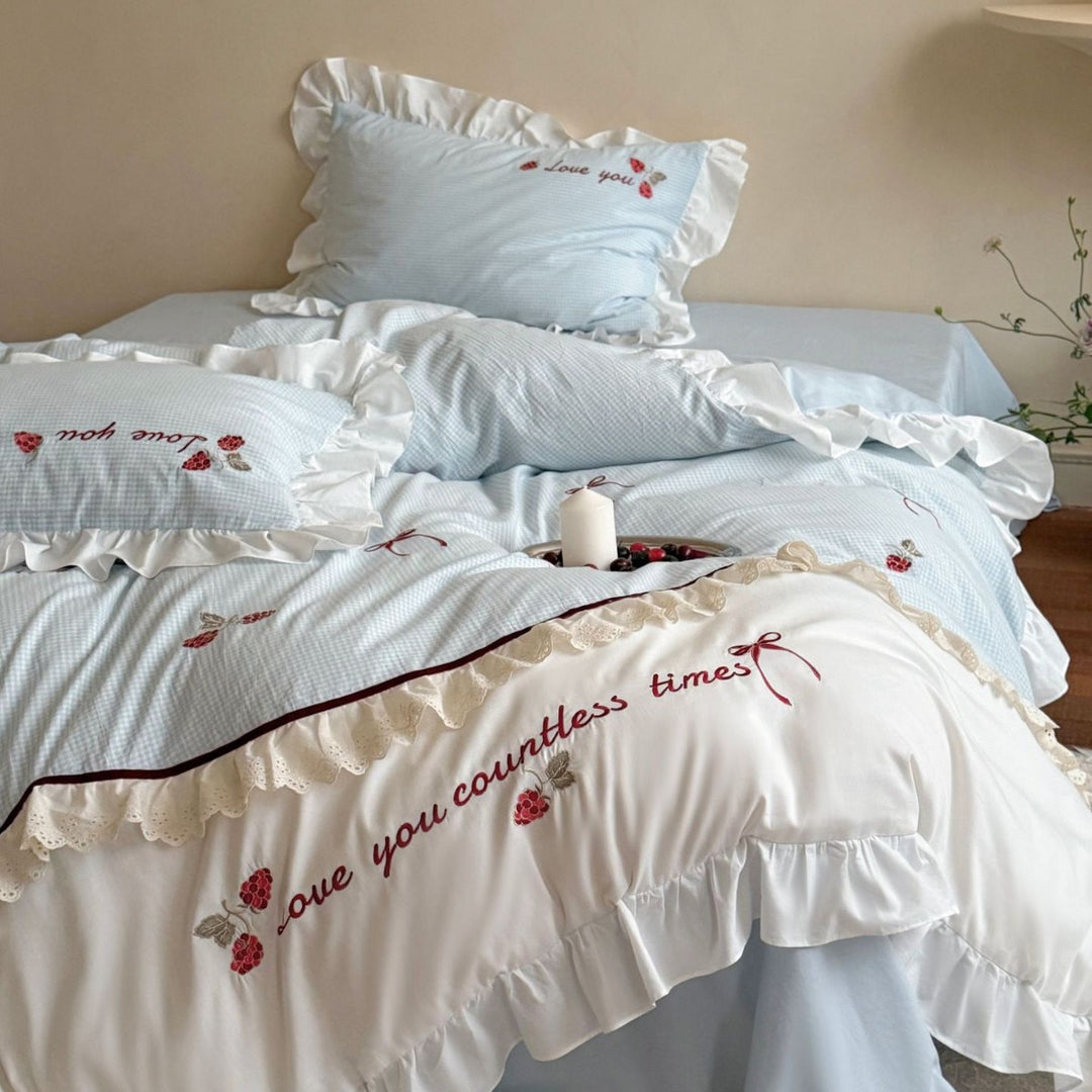 Bedding set made of breathable cotton blend with ruffle and flower bow embroidery