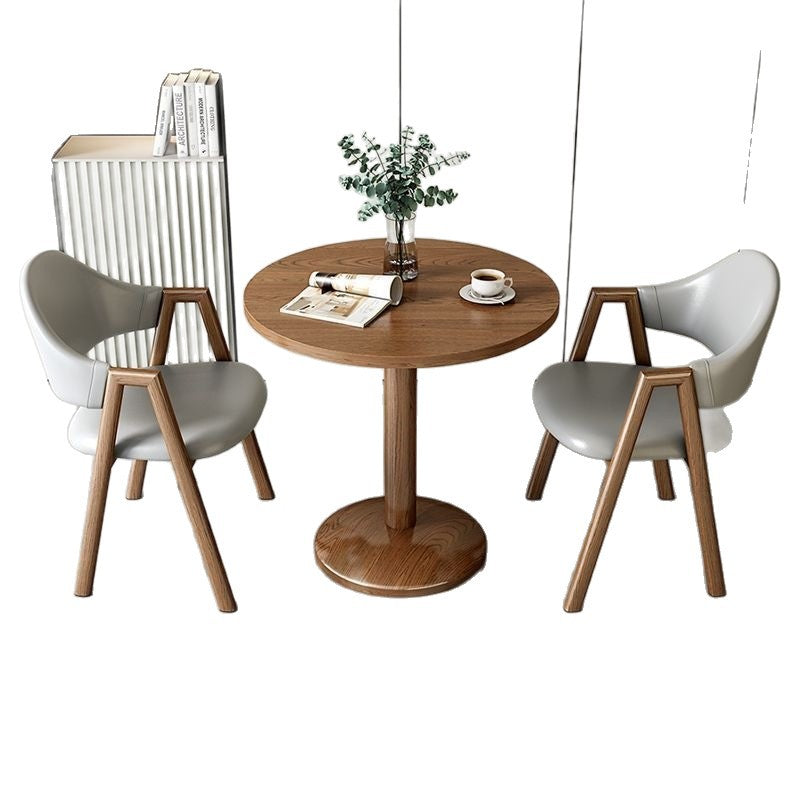 Designer table with marble top and stable metal base Stornfield