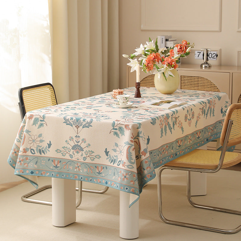 Rectangular easy-care tablecloth in floral jacquard with decorative border Stornfield