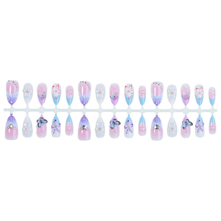 Creative nail art set with floral and butterfly motifs Stornfield