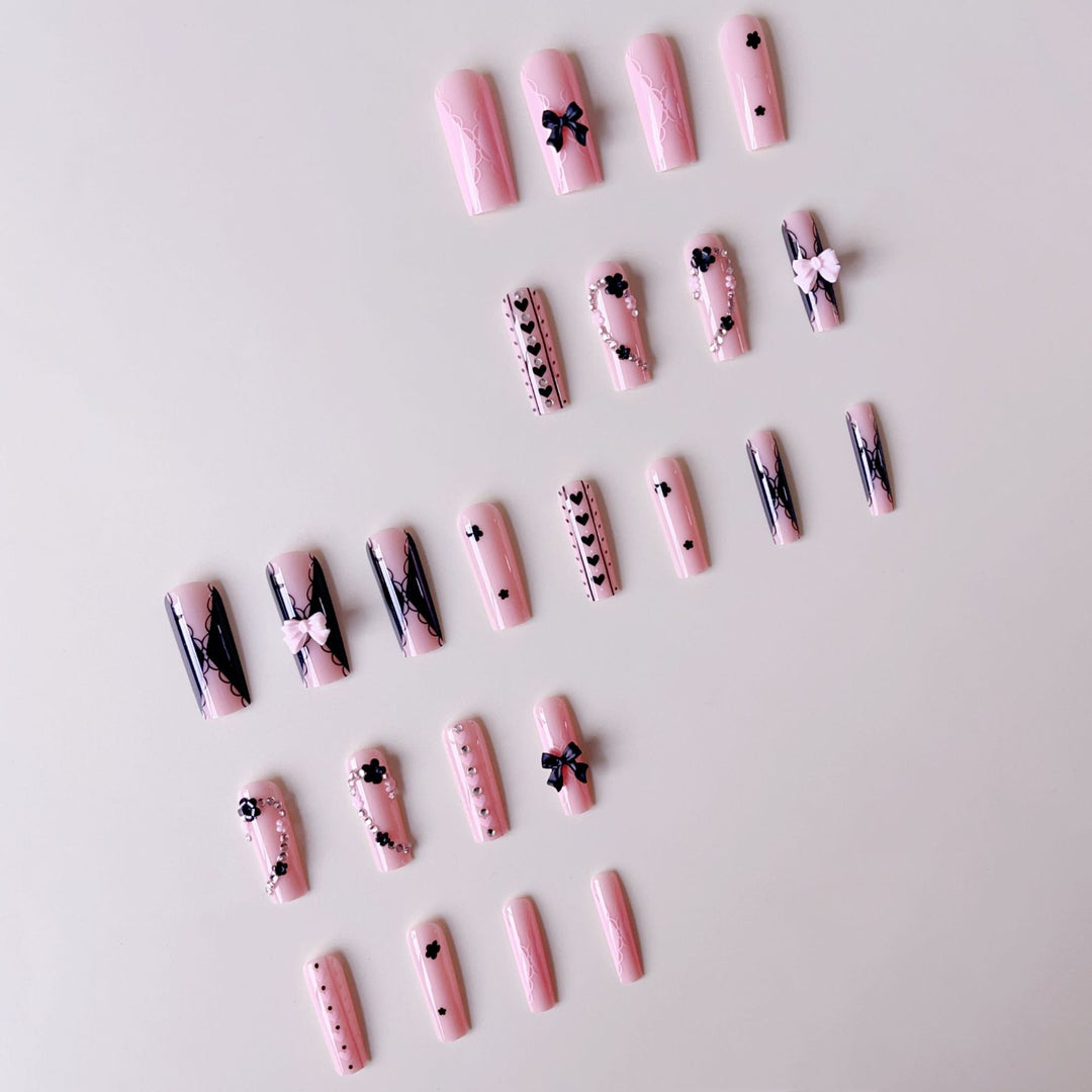 Fake nail set with playful 3D roses and elegant accents Stornfield