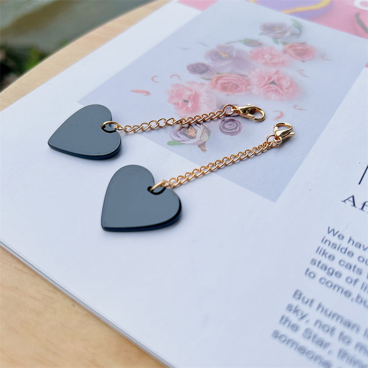 Heart-Shaped Dangle Earrings with Golden Chain Stornfield