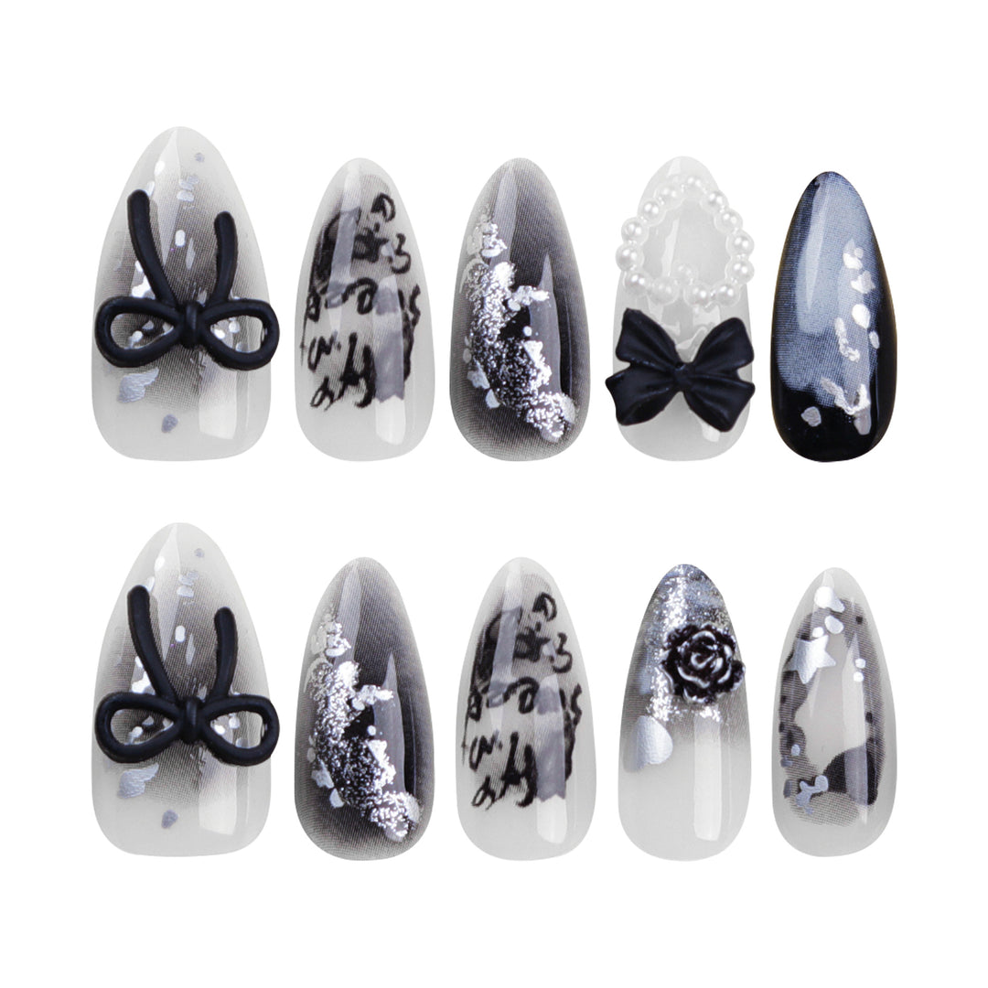 Artificial nail art with unique black and white design Stornfield