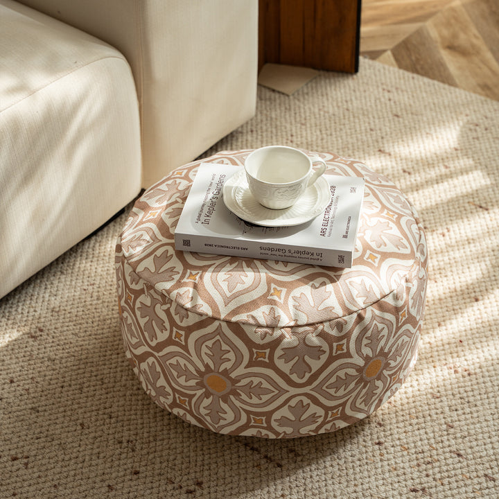 Round seat pouf with woven jacquard structure and practical carrying handle Stornfield