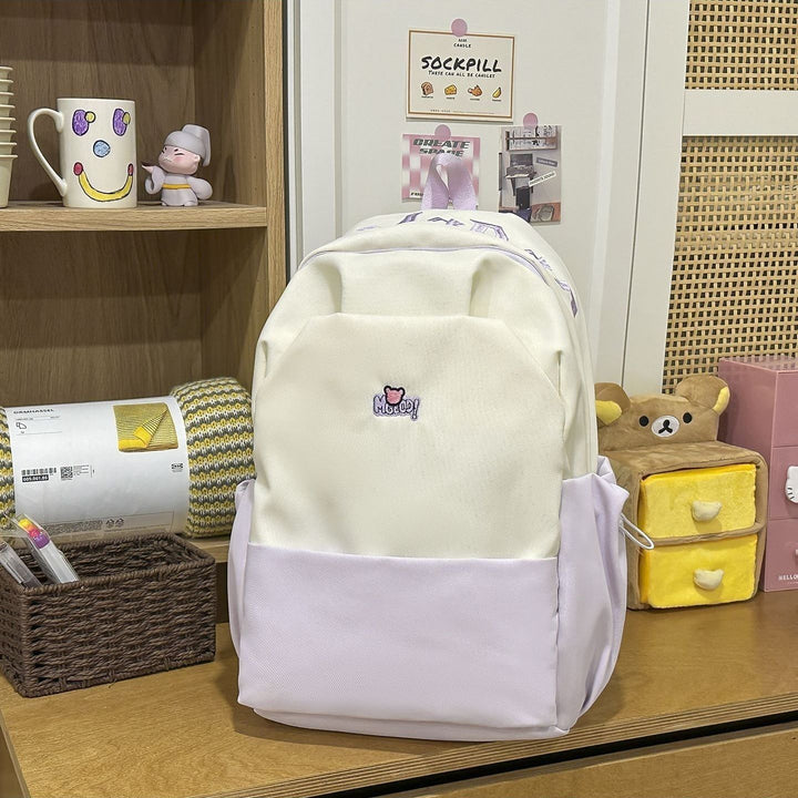 Playful backpack with embroidered Stornfield motif