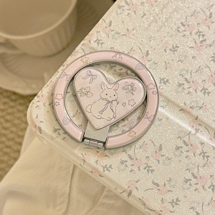 Playful smartphone finger holder with heart design Stornfield
