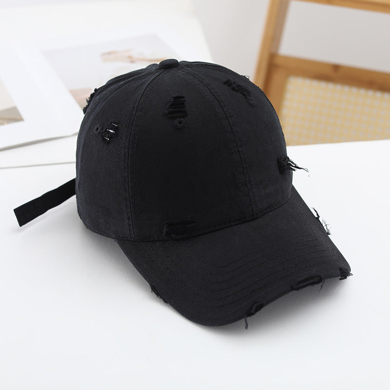 Women's fashionable destroyed baseball cap with adjustable strap Stornfield