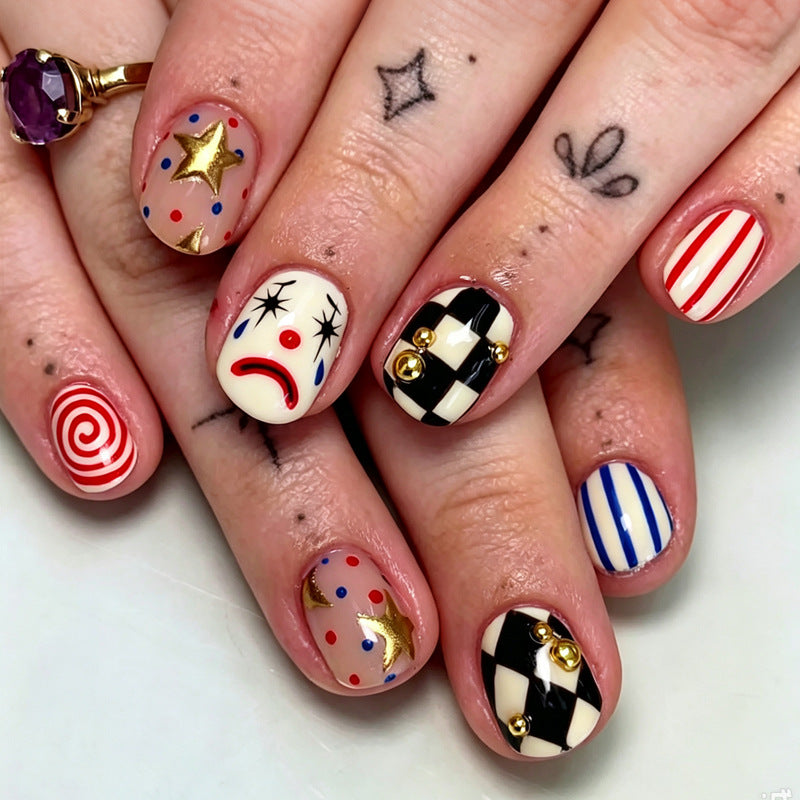 Artifical nail set with creative clown and star motifs Stornfield