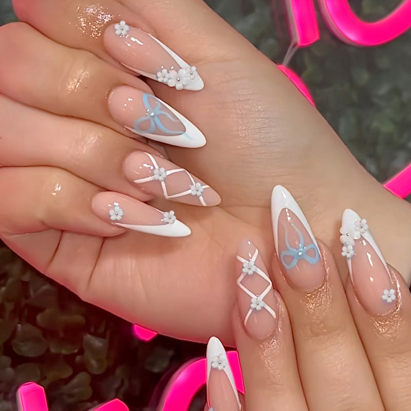 Elegant artificial nails with floral and decorative details Stornfield