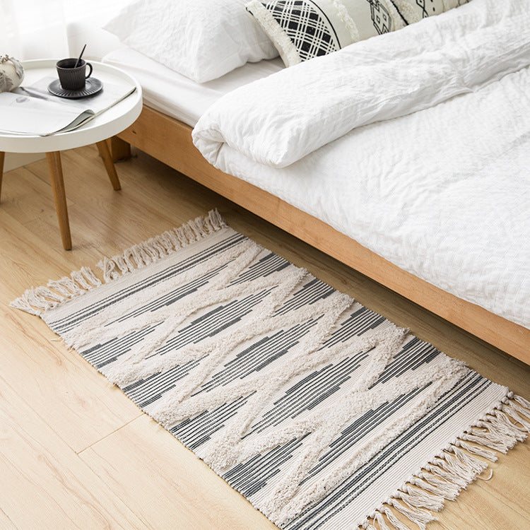 Beef-structured bath mat made of cotton blend with raised stripe relief