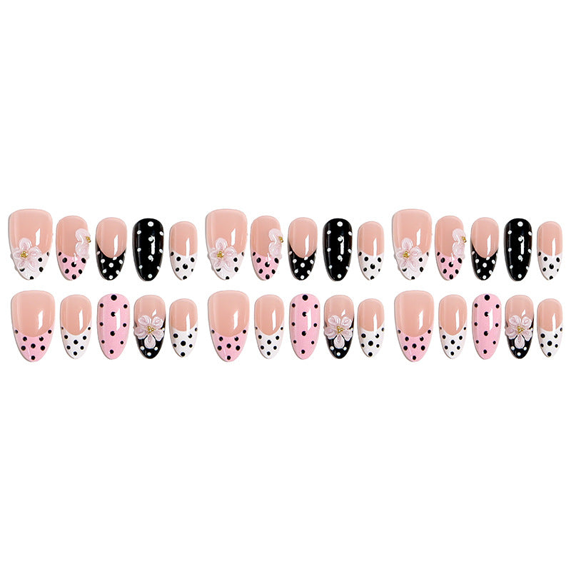 Nail art set with floral accents and elegant dots Stornfield