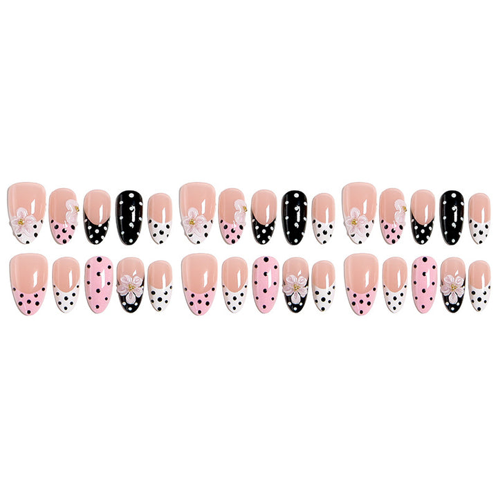 Nail art set with floral accents and elegant dots Stornfield