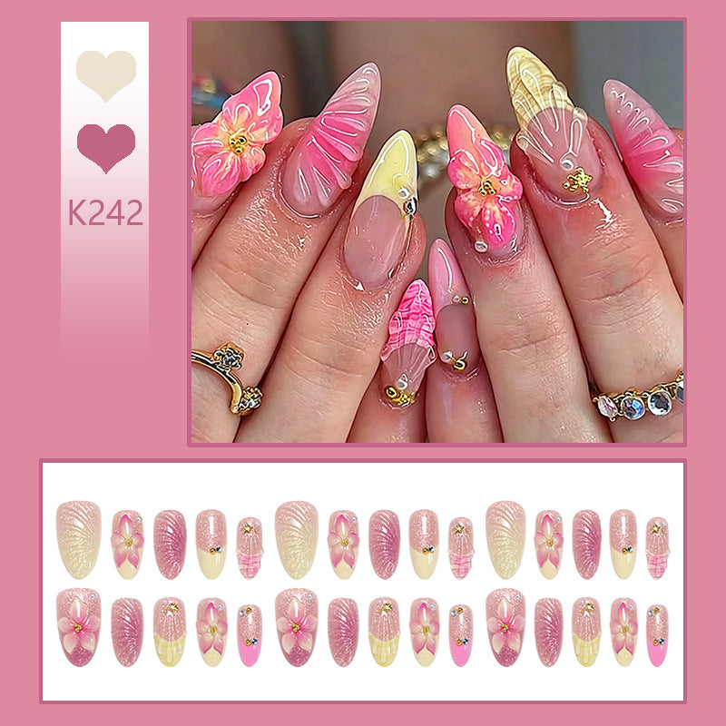 Art nail set with filigree flower decorations and glitter elements Stornfield