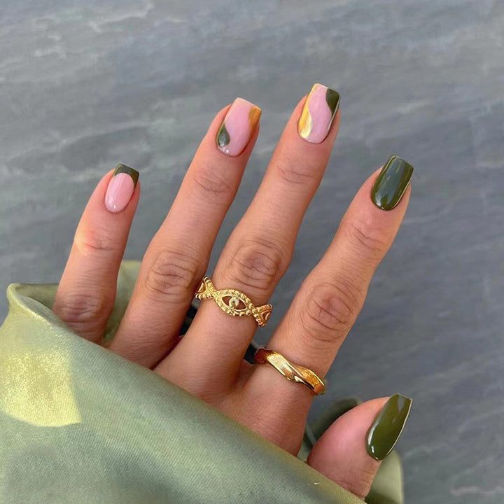 Artful nail extensions with an elegant leaf pattern Stornfield