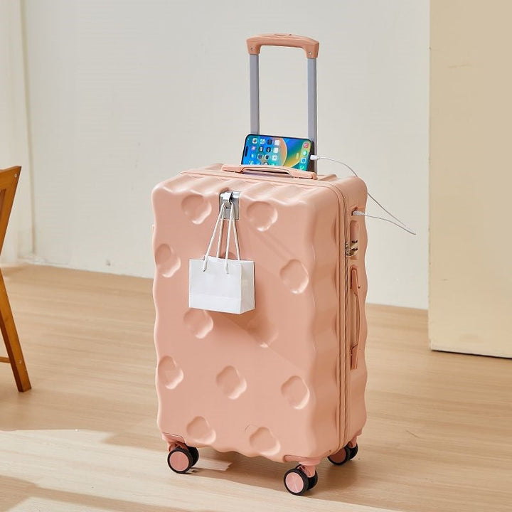 hard-shell carry-on suitcase with integrated foldable cup holder phone cradle USB charging port and external bag hooks Stornfield
