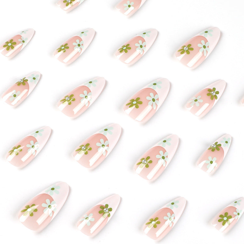 Artful nail art with delicate floral motifs Stornfield