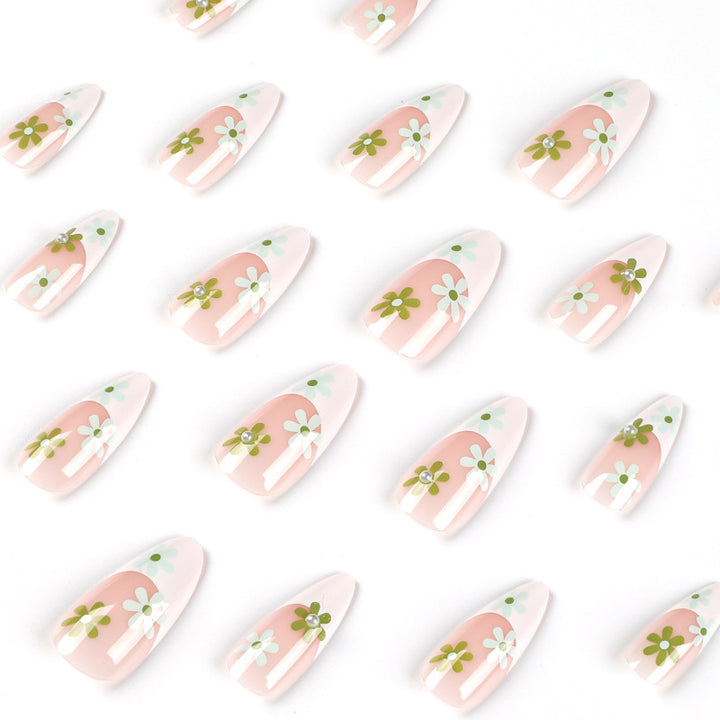 Artful nail art with delicate floral motifs Stornfield