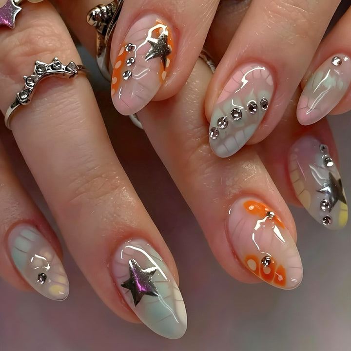 Acrylic nail set with creative designs and glitter accents Stornfield
